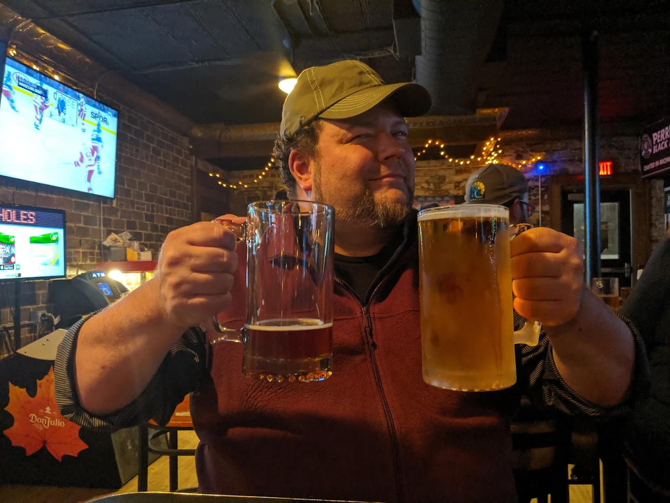 Guests enjoying cold beers inside Duke's Bar